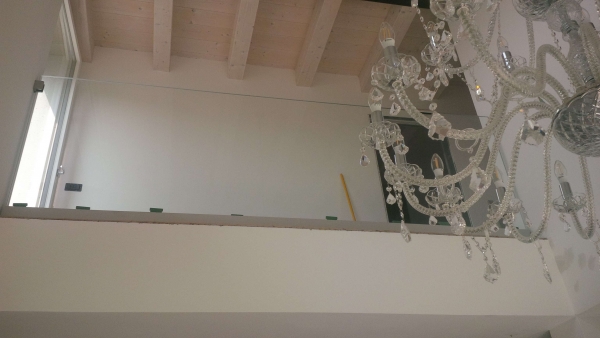 Interior Staircase with Frameless Glass Railings and stainless Steel Post with standoffs